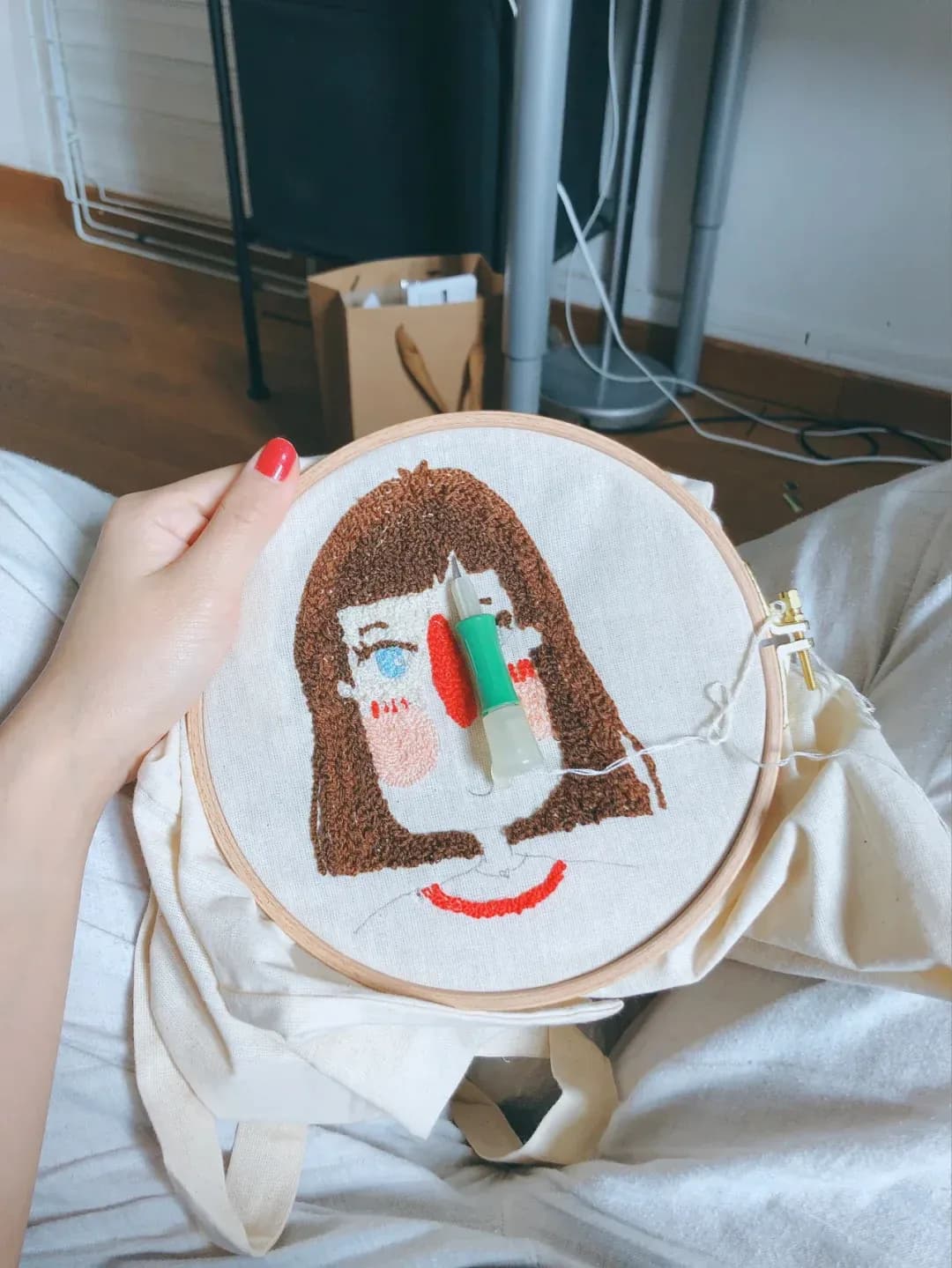Embroidered character tote in progress